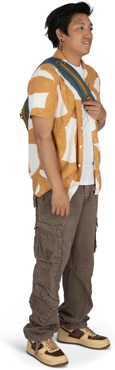 imageOsprey Daylite Shoulder Sling Bag Compact Crossbody Backpack for Everyday Carry Festivals and Lightweight TravelPorcelain Orange