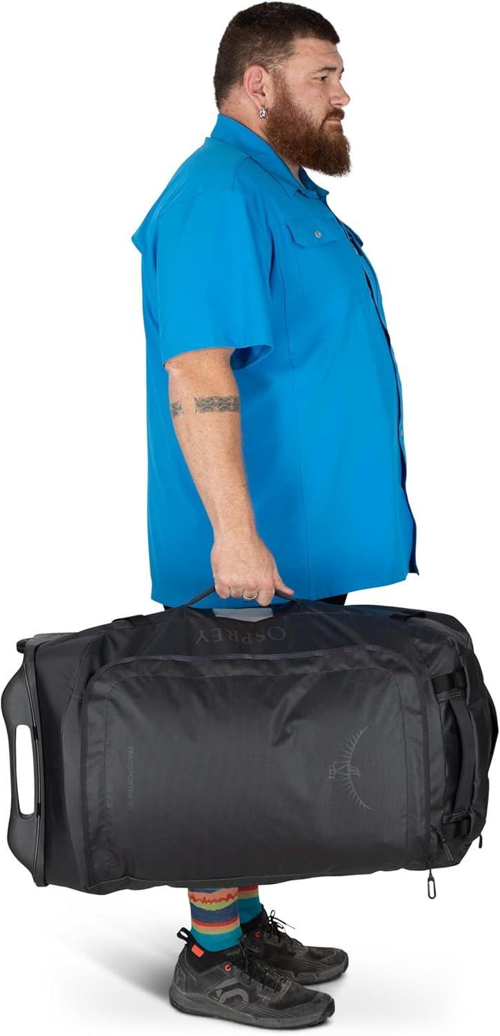imageOsprey Transporter 60L Wheeled Travel Duffel Bag Lightweight Rolling Suitcase for Men and Women Blue FlameNocturnal BlueRaven Black