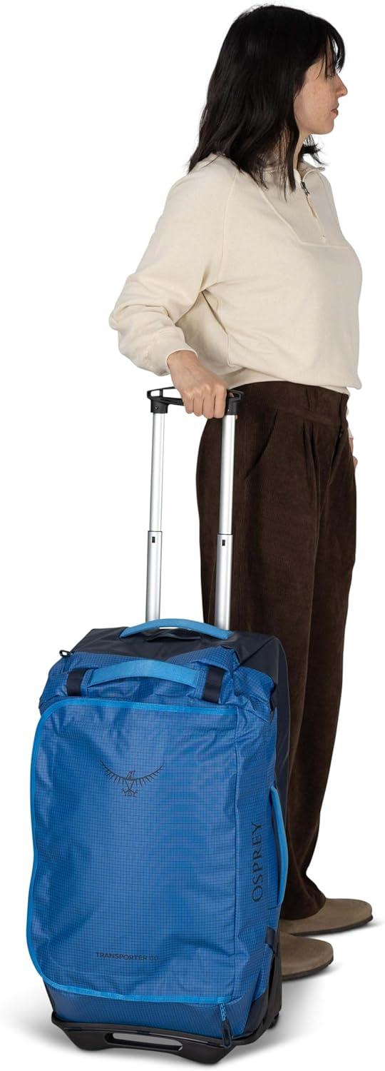 imageOsprey Transporter 60L Wheeled Travel Duffel Bag Lightweight Rolling Suitcase for Men and Women Blue FlameNocturnal BlueRaven Black