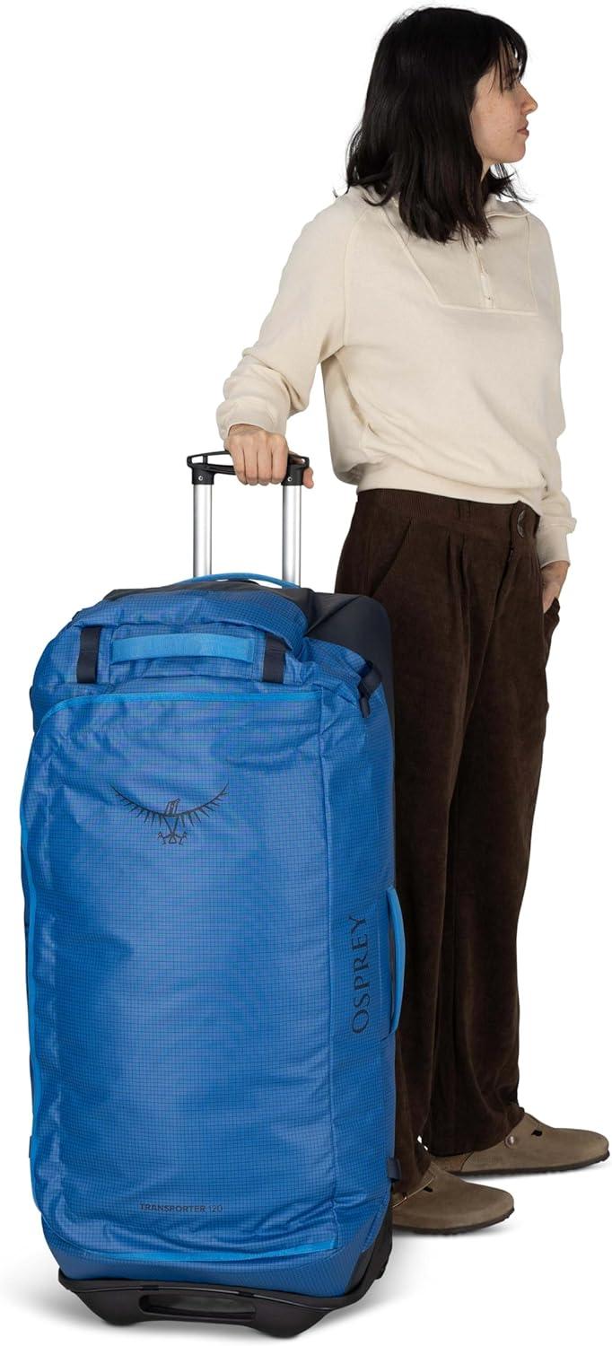 imageOsprey Transporter 60L Wheeled Travel Duffel Bag Lightweight Rolling Suitcase for Men and Women Blue FlameNocturnal BlueRaven Black