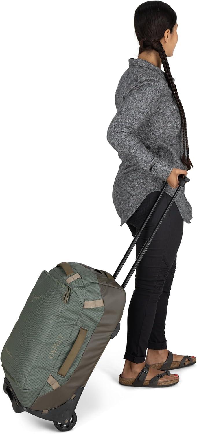 imageOsprey Transporter 60L Wheeled Travel Duffel Bag Lightweight Rolling Suitcase for Men and Women Blue FlameNocturnal BlueRaven Black